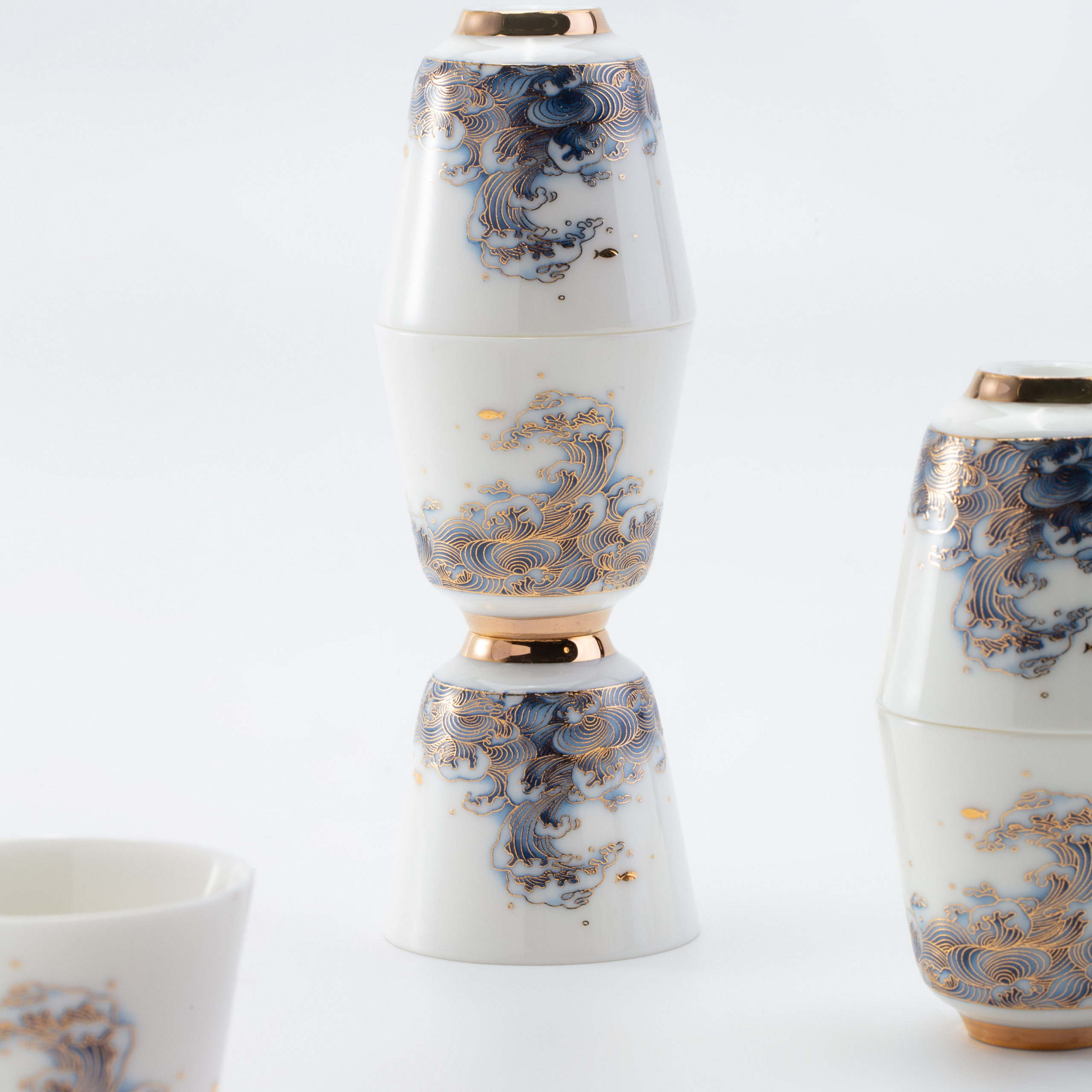Set of ceramic vases with decorative patterns on a white background