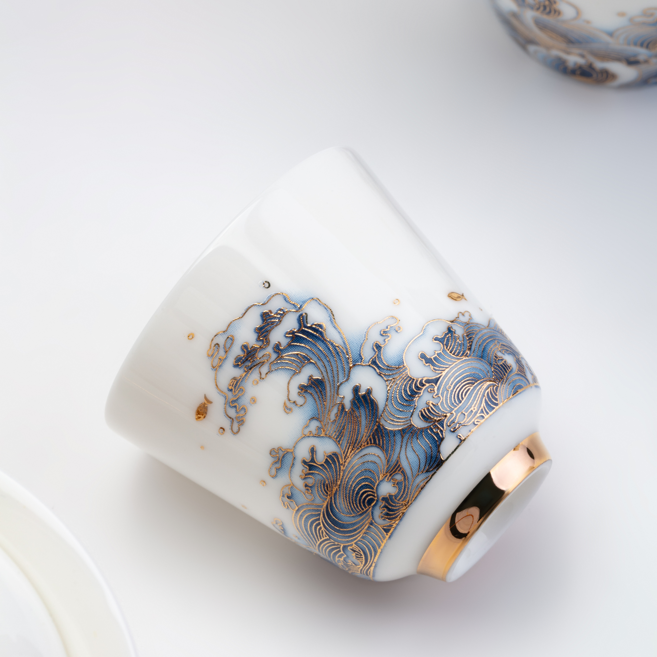 Ceramic cup with wave design on a white background