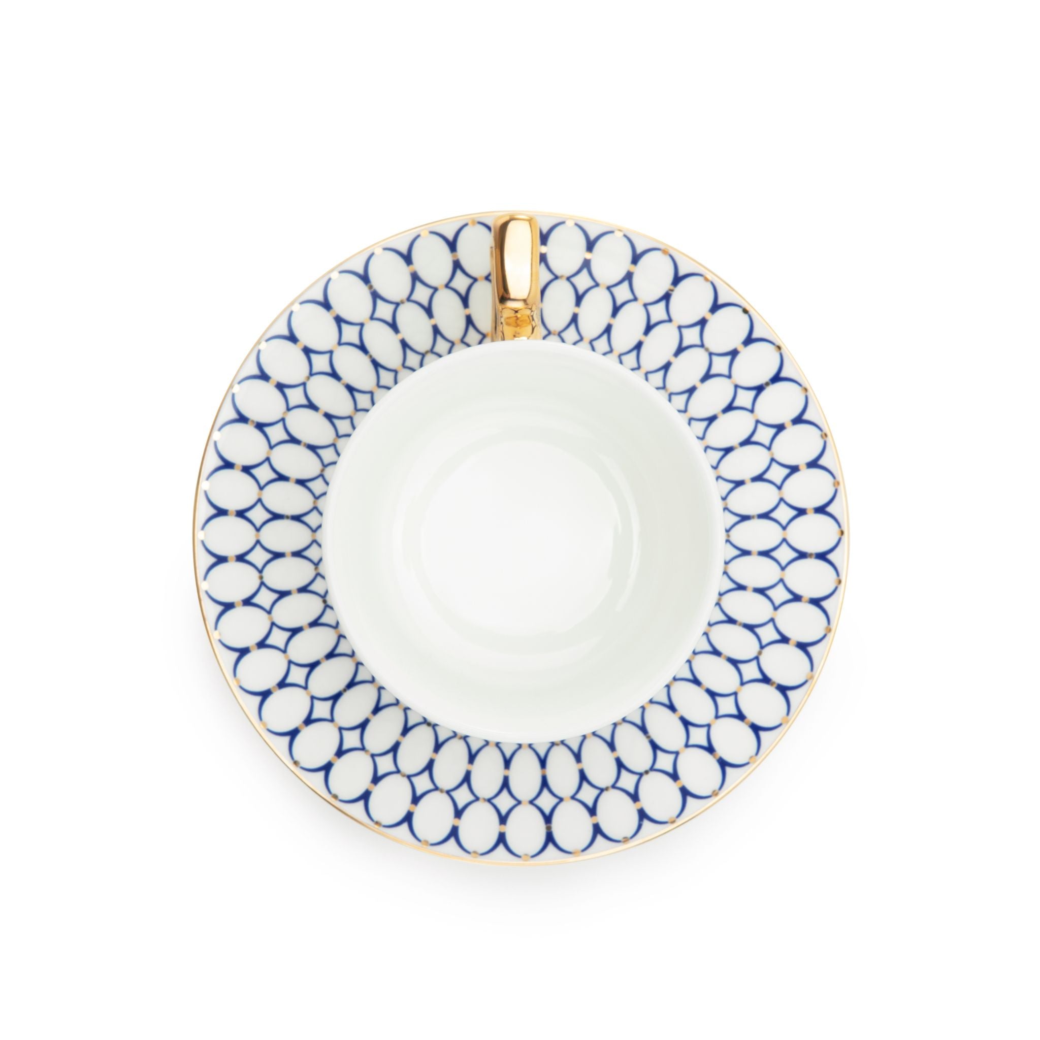White saucer with blue pattern and gold rim on a white background