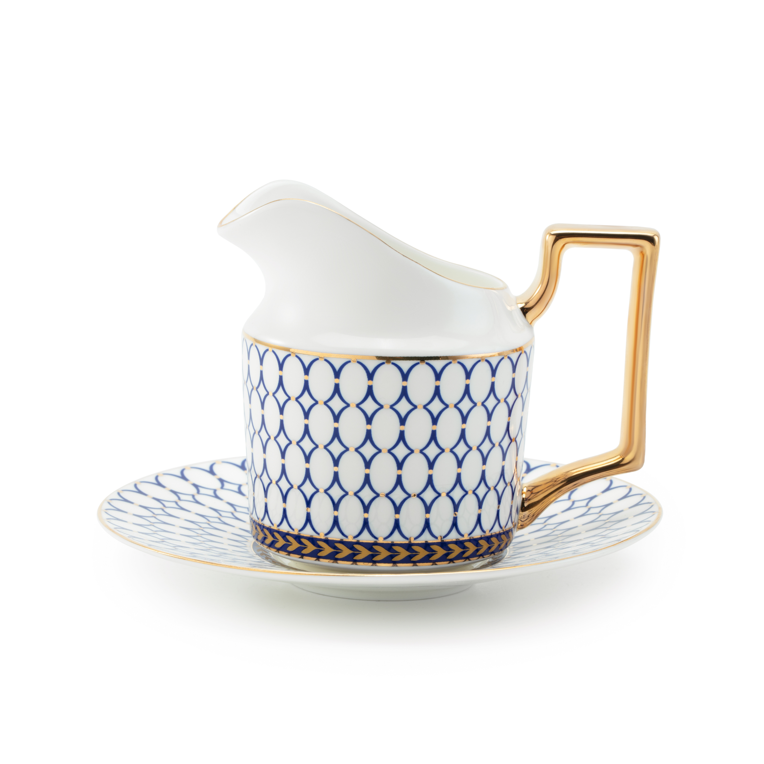 White creamer with blue decorative band and gold accents on a Saucer