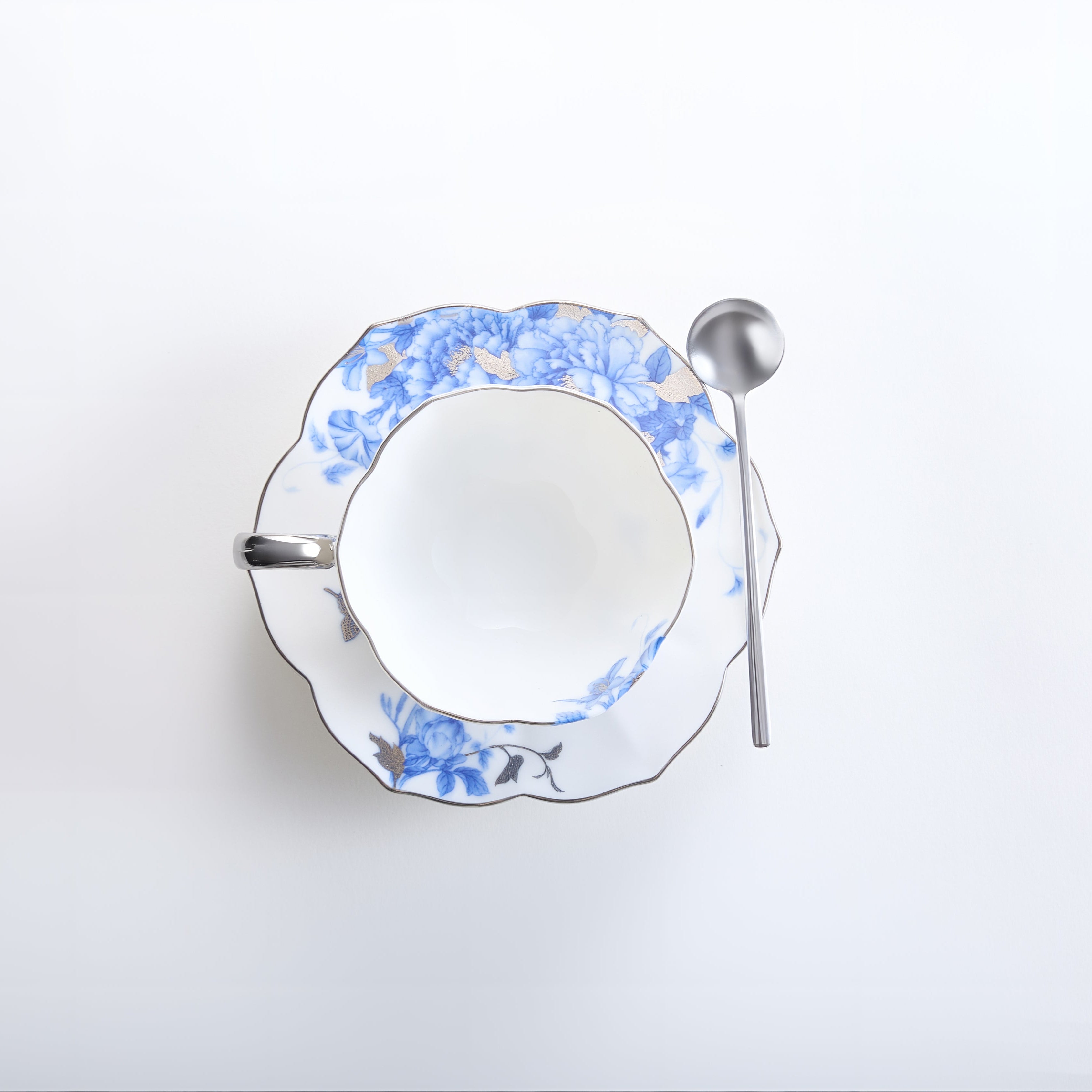Teacup with floral design on a white background
