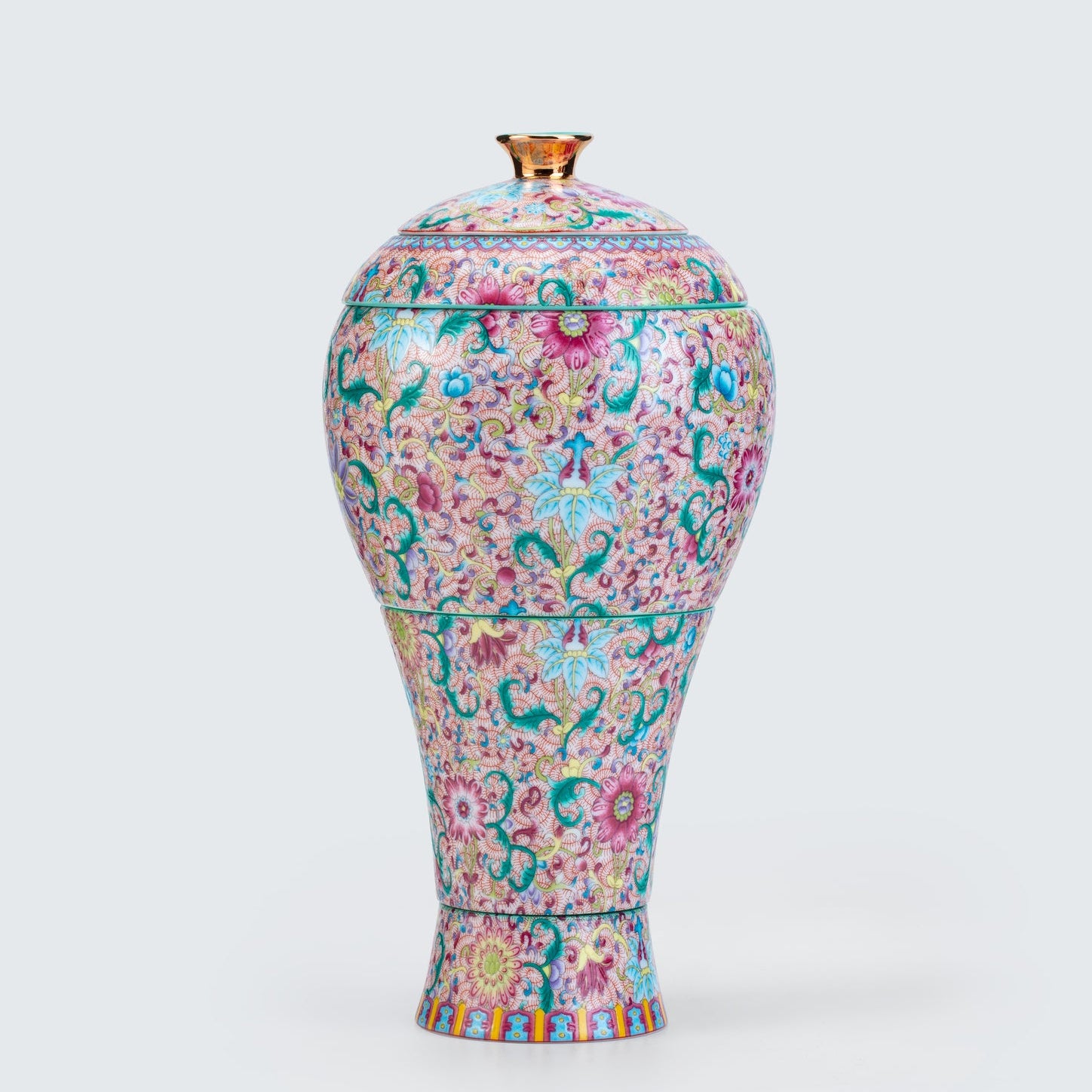 Decorative vase with floral pattern on a white background