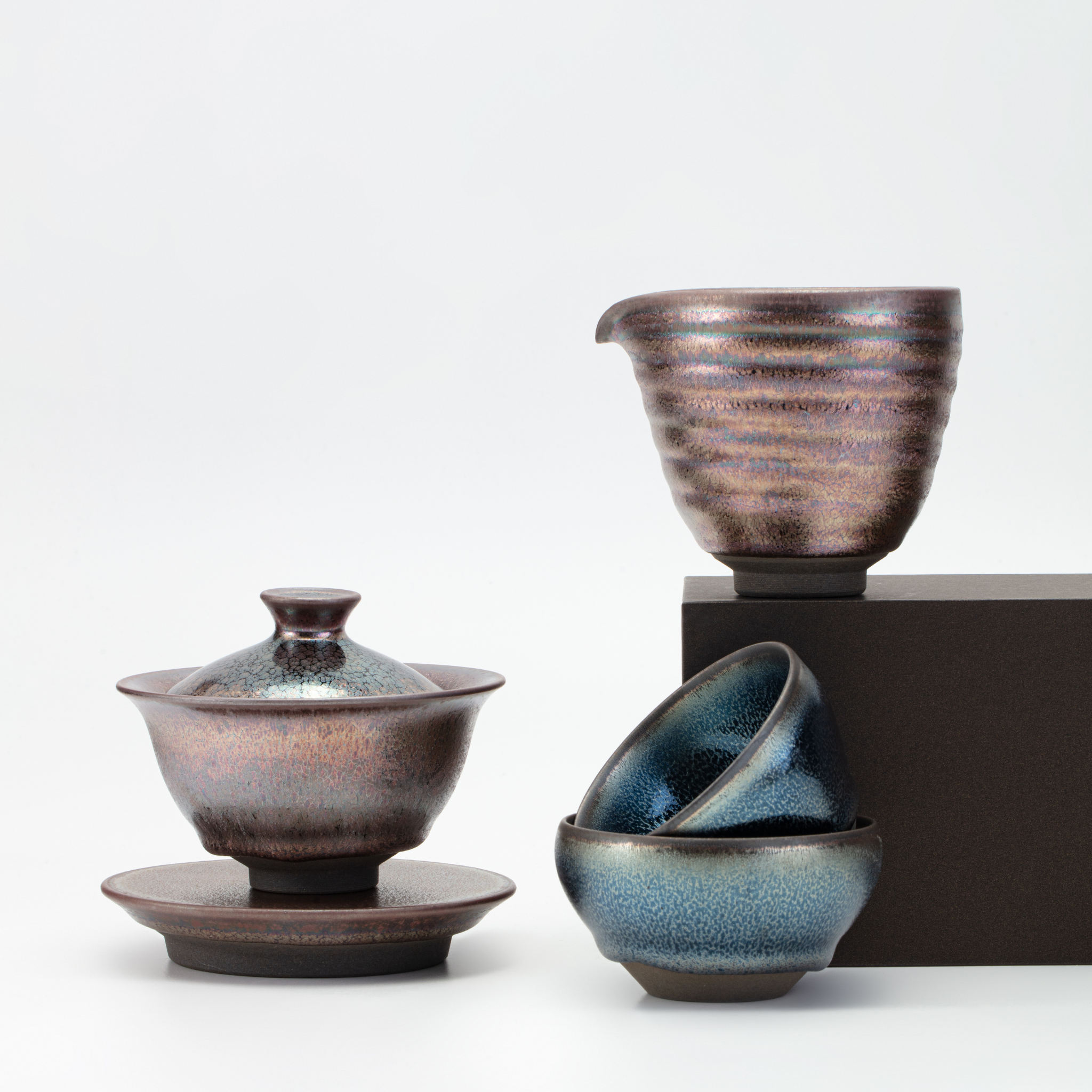 Set of ceramic bowls with different designs on a white background
